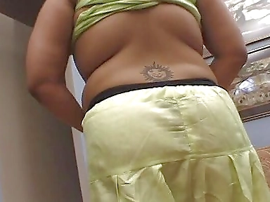 Indian big with a tattoo rides a cock in threesome