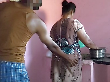 Aunty was working in the kitchen when I had sex with her